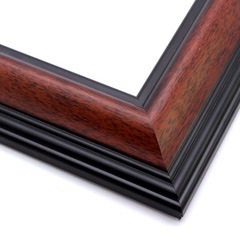 This simple, reverse scoop frame features bevelled inner and outer edges in matte black. The deep walnut wash with wood grain detailing gives this frame a modern, rustic look.

2.5 " width: ideal for medium and large images. Pair the natural effect of the face with a bucolic farm photograph, or utilize the modern black edge by bordering a contemporary Giclée print.